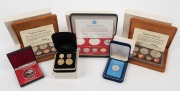 Cook Islands - Coins: 1975 Seven Coin Proof sets (2); PNG 1976 Eight coin Proof set; PNG 1976 K10 silver Proof; Panama 1976 150 Balboa Proof; and a pair of coin-shaped earrings. All in cases of issue.
