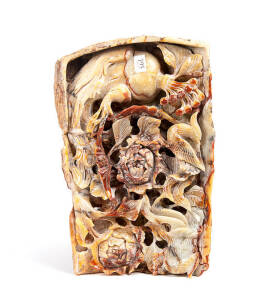 A large and heavy soapstone carving depicting birds and peony, 20th century, 24 x 36cm
