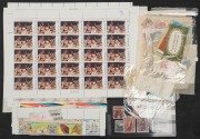 A pre-decimal and decimal accumulation in a large envelope; very random range incl. 10/- & &pound;1 Robes Used (several of each in mixed condition) and a half sheet of $4 Paintings MUH.&nbsp;