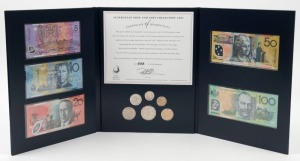 1997 Australian Note & Coin Collection, limited edition portfolio produced by Note Printing Australia [#683/1500] containing all coins (5c - $2) and banknotes ($5 - $100) issued that year in Unc condition; the banknotes with ZZ prefixes.