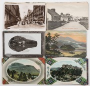 Postcards: BRITISH ISLES - SCOTLAND: A collection of mainly photographic postcards featuring street views of towns, villages, island scenes, rolling stock being dug out of a snow drift, lochs, craigs, castles, bridges, etc.&nbsp;(Total: 56; 15 unused; 41 used)