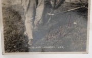 AN ARCHIVE OF AMY JOHNSON MEMORABILIA. The archive comprises: a signed postcard of Johnson standing next to her DH60G Gipsy Moth; Amy Johnson's fur-lined leather flying helmet by Pike Brothers of Brisbane; a leather-bound and boxed "Presentation [album] t - 8