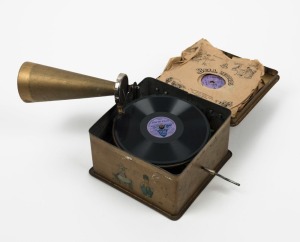 FAIRY MELODIOUS GRAMOPHONE vintage hand-cranked child's gramophone player in original tin, with three records, early 20th century, ​​​​​​​9cm high, 16cm wide, 16cm deep