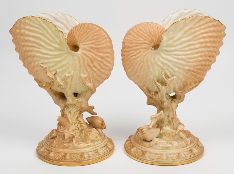 ROYAL WORCESTER pair of nautilus shell vases, 19th century, puce factory mark to the bases, ​​​​​​​21cm high