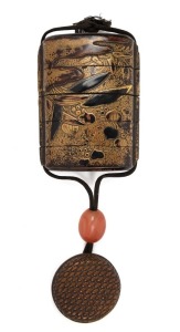 An antique Japanese Urushi lacquer inro with gold leaf maki, adorned with carnelian ojime and finely carved boxwood basket netsuke, Edo period, mid 18th century, 6.5cm high
