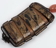 An antique Japanese Urushi lacquer inro with gold leaf maki, adorned with carnelian ojime and finely carved boxwood basket netsuke, Edo period, mid 18th century, ​​​​​​​6.5cm high - 8
