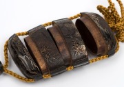 A fine antique Japanese Urushi gold leaf lacquered three case inro featuring a tiger on one side and a dragon on the reverse. Carved wooden netsuke with three aubergines representing happiness and prosperity, Edo period, 18th/19th century, 6.5cm high - 9