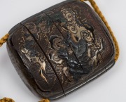 A fine antique Japanese Urushi gold leaf lacquered three case inro featuring a tiger on one side and a dragon on the reverse. Carved wooden netsuke with three aubergines representing happiness and prosperity, Edo period, 18th/19th century, 6.5cm high - 10