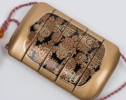 An antique Japanese four case&nbsp;inro&nbsp;with Kajikawa family seal with matching netsuke, ​​​​​​​10.5cm high - 6