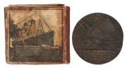 LUSITANIA cast bronze medal (55mm), housed in original card box of issue with lithograph top depicting a portrait of the ill-fated ship "R.M.S. LUSITANIA, Cunard Line 32,000 Tons. Sunk On Her Journey From The United States By A German Submarine, May 7th 1