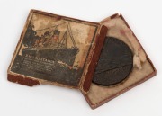 LUSITANIA cast bronze medal (55mm), housed in original card box of issue with lithograph top depicting a portrait of the ill-fated ship "R.M.S. LUSITANIA, Cunard Line 32,000 Tons. Sunk On Her Journey From The United States By A German Submarine, May 7th 1 - 4