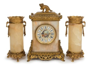 A fine quality antique French three piece clock set in the Chinese style, onyx case with ormolu mounts and Foo dog finial, time only lever platform escapement movement, fine enamel decorated dial with retailers name "Edward & Sons, Paris, London, Glasgow", attractive small size, circa 1870, the clock 24cm high