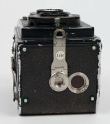 FRANKE & HEIDECKE: Circa 1932 Rolleiflex Old Standard TLR camera [#265551] with Tessar 75mm f3.8 lens [#1411215] and metal lens cap, with directions in German on rear. - 4