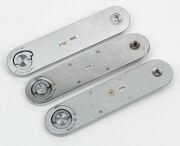 LEITZ: Three chrome Leica camera baseplates for Leica IIIa, IIIb, or&nbsp;IIIg. (3&nbsp;items)