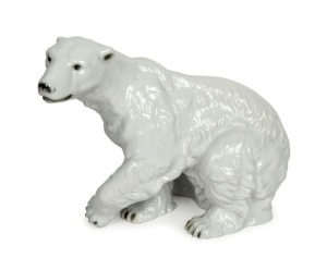 ROYAL DUX Czechoslovakian porcelain polar bear statue, 20th century, pink triangle mark to base, ​​​​​​​26cm high, 31cm long