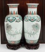 A pair of antique Chinese famille vert porcelain vases on later carved wooden stands, housed in a plush silk lined rosewood box, Qing Dynasty, 19th century. 25cm high - 2