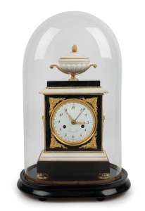 RADANT fine and attractive antique French Empire clock under glass dome, black and white marble case with fine ormolu mounts, one piece convex enamel dial with Arabic numerals and rare thirty day jump calendar hand (introduced for a short period during the French Revolution), the dial signed "Radant à Paris", eight day time and bell striking movement with silk suspension pendulum and outside count wheel. Radant was active in Paris from 1807 until 1812. the clock 36 high, 49cm high overall