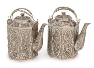 An attractive pair of Chinese Straits silver teapots, 19th/20th century, marker's marks to base (illegible), 13cm high overall, 470 grams total