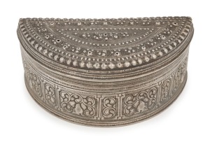 An antique Burmese silver demi-lune betel box with hinged lid and repousse decoration, 19th/20th century, 4cm high, 9.5cm wide, 122 grams