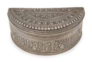 An antique Burmese silver demi-lune betel box with hinged lid and repousse decoration, 19th/20th century, ​​​​​​​4cm high, 9.5cm wide, 122 grams