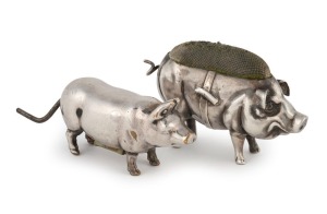 Antique sterling silver pig pin cushion, together with a sterling silver pig tape measure, (2 items), the larger 3.5cm high, 6cm long