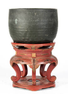 A Japanese large bronze Gong in the form of a jardiniere, an inscription beneath the rim, probably from a temple, supported on a lacquer wood stand. 75.5cm high overall, 47cm diameter