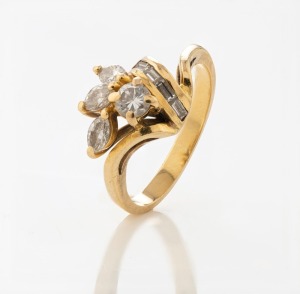 A yellow gold ring, set with marquise, brilliant and baguette cut diamonds, marks illegible, 4.2 grams total