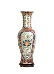 A massive decorative baluster vase on hardwood stand, 145cm high, 45cm diameter at the mouth
