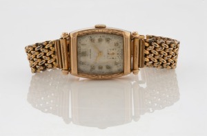 DUNKLINGS 9ct gold case gent's manual wristwatch with silvered dial, subsidiary seconds and Arabic numerals, the movement French and Swiss made, with rolled gold bracelet, 27mm across the dial including crown