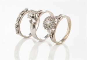 Three 18ct white gold rings, set with brilliant cut diamonds, 11.3 grams total