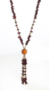 A tumbled garnet and silver bead necklace, ​​​​​​​45cm long
