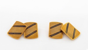 A pair of Art Deco 9ct yellow gold and blue enamel cufflinks housed in a fitted box branded "T. GAUNT & Co.", 5.8 grams