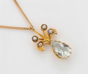 An Italian 9ct yellow gold chain with an antique yellow gold pendant, set with a cut aquamarine and seed pearls, stamped "Italy, 375", the pendant 2cm high, the chain 38cm long, 2.3 grams total