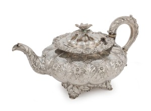 A Georgian sterling silver teapot by REBECCA EMES & EDWARD BARNARD I of London, circa 1828, 15cm high, 28cm wide, 888 grams total