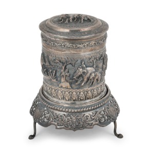 A Burmese silver circular box with repousse decoration on pierced silver stand, 20th century, 13.5cm high, 178 grams