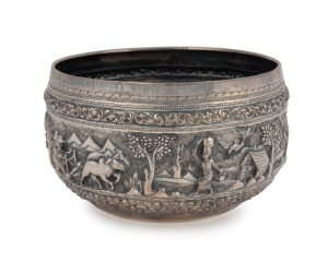 A Burmese silver bowl adorned with repousse decoration, 20th century, 9.5cm high, 16cm wide, 350 grams
