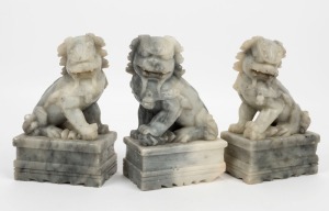 Three vintage Chinese carved marble Foo Dogs, 20th century, ​​​​​​​the largest 18cm high