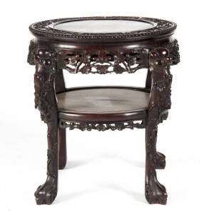 A Japanese hardwood two tiered round table with dragon legs, early 20th century