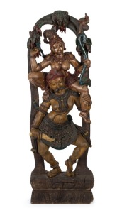 NIRITI panel, (Niriti guiding a man in the direction of heaven), carved wood with polychrome finish, South Indian origin, 19th century, 183cm high