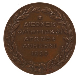 1896 Athens Olympics, bronze participation medal; 50mm; designed by N. Lytras; seated Nike holding laurel wreath over phoenix emerging from flames, Acropolis in background. Lovely condition.