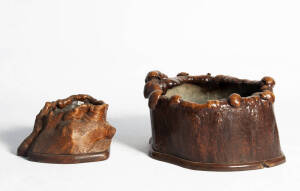 Two Japanese burl wood hibachis, 1st half 20th century, 32cm high, 59cm wide and 22cm high and 36cm wide