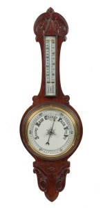 An antique aneroid banjo barometer in timber case, 19th century, ​​​​​​​82cm high.