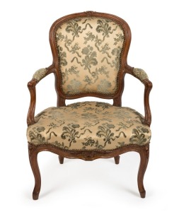 An antique French fauteuil, carved beech with vintage satin and chenille upholstery, circa 1760