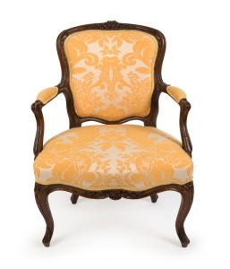 An antique French fauteuil, carved walnut frame with gold damask upholstery, circa 1750, 84cmhigh x 63cm high