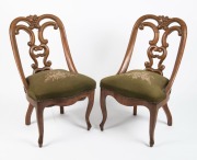 A set of four antique carved walnut salon chairs with French cabriole legs and green floral tapestry upholstery, mid 19th century, 82cm high - 6