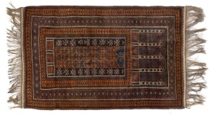 A Persian hand-knotted prayer rug on brown and blue ground with orange highlights, ​​​​​​​150 x 95cm.