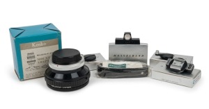 HASSELBLAD: six c. 1960s camera attachments in original retail packaging - one TISLC Spirit Level, one TIFKC Adjustable Flash Shoe, one TIRCC Quick Winding Crank, one 41076 Quick Winding Crank, one Hasselblad wrist strap, and one Kenko mount adapter for H