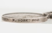 The QUEEN'S SOUTH AFRICA MEDAL with clasps for RELIEF OF LADYSMITH, TUGELA HEIGHTS, LAINGS NEK and TRANSVAAL, named to 4819 COR'L J.E. STOREY. W. YORK: REG'T. - 5