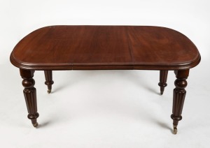 An antique English mahogany extension dining table with extension leaf and winder, circa 1860, 72cm high, 102cm wide (143cm extended), 103cm deep