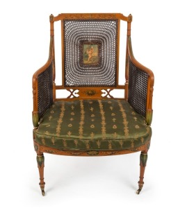 An antique Sheraton Revival satinwood armchair with cane sides and back, attractively hand-painted in the Angelica Kauffman style, late 19th century, 98cm high, 66cm across the arms